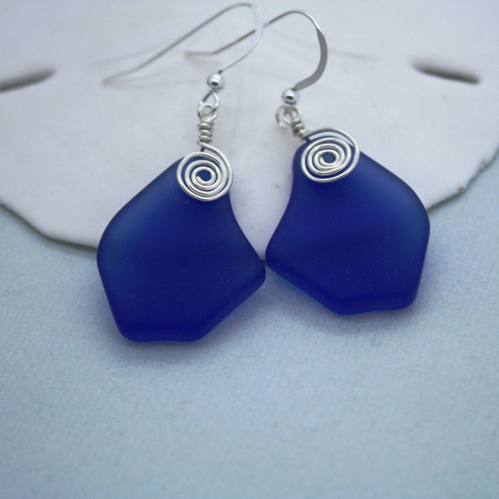 Blue sea glass dangle earrings with silver spiral wire, coastal boho chic style