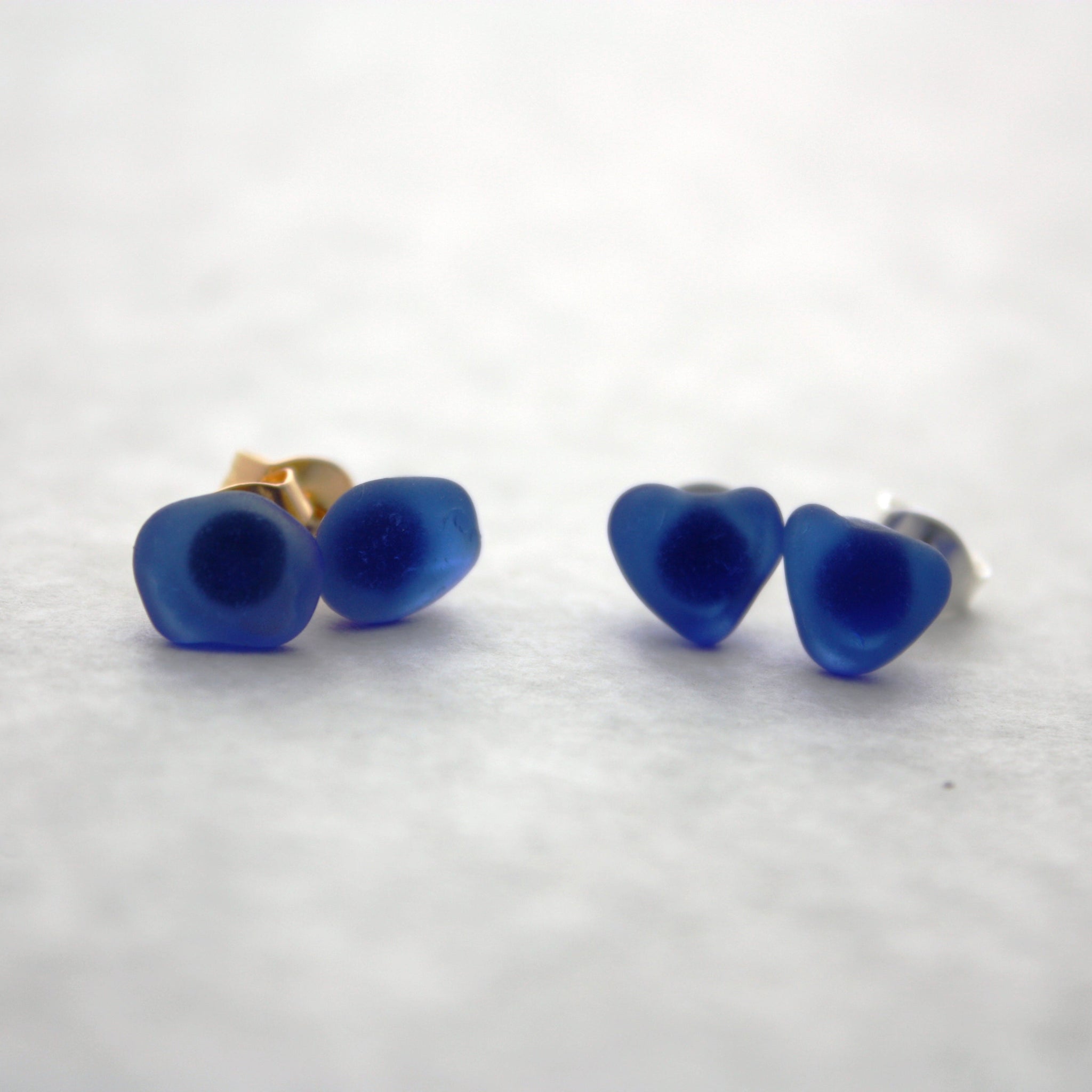 minimalist cobalt sea glass earrings with gold posts coastal jewelry style